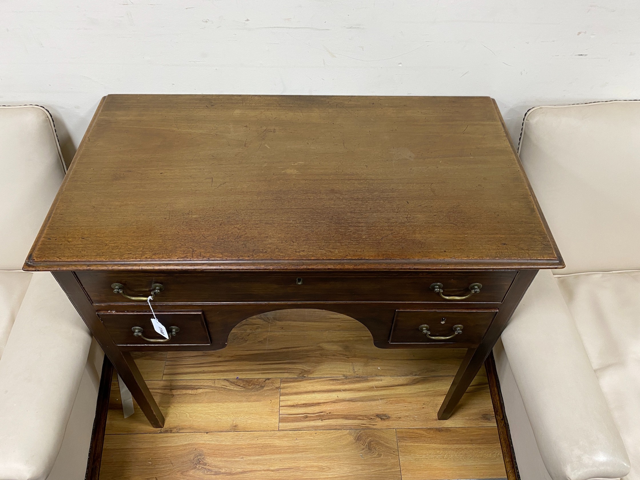 A small George III mahogany kneehole side table, width 92cm, depth 50cm, height 78cm
